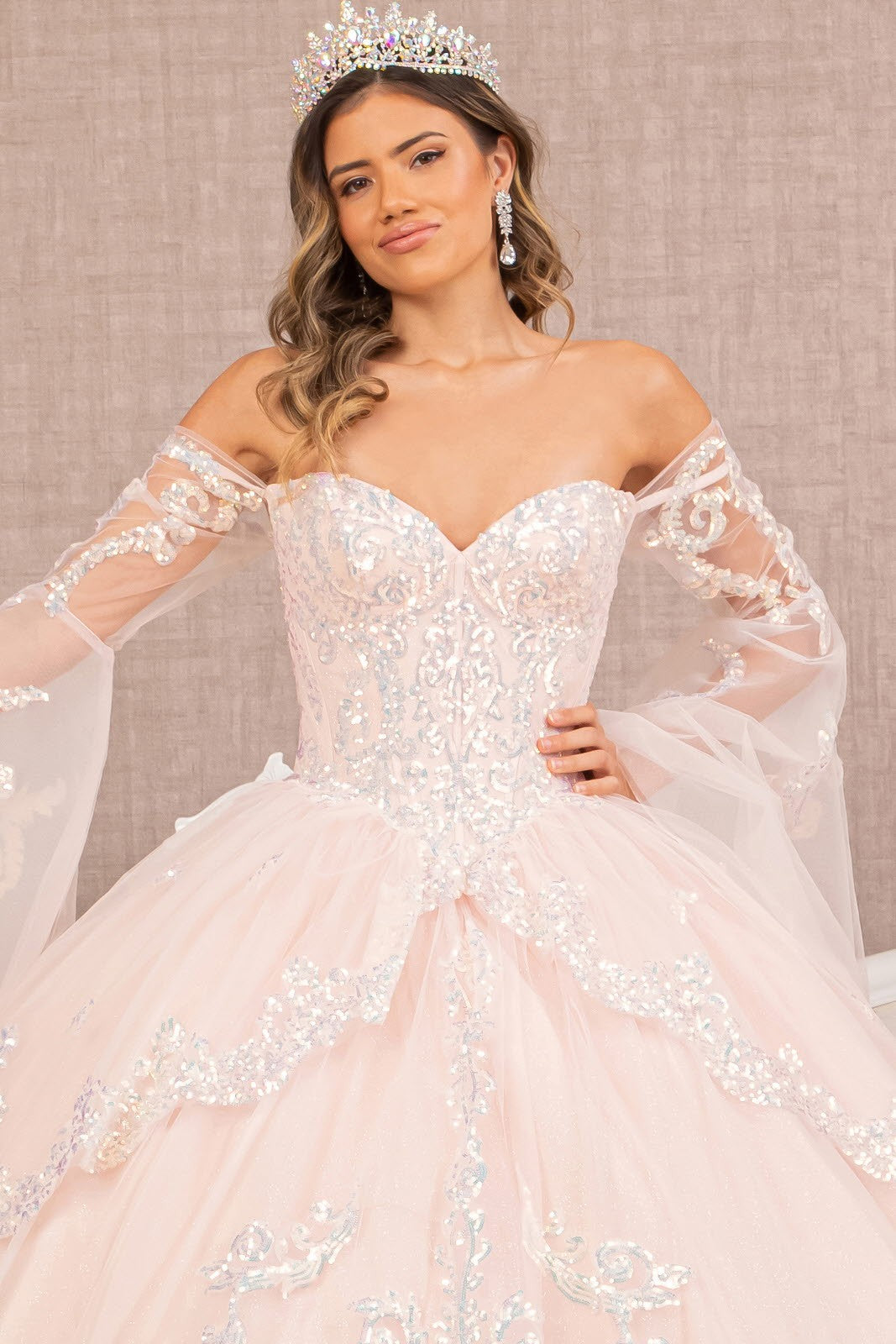 Long Sleeve Glitter Layered Hem Quinceanera Gown