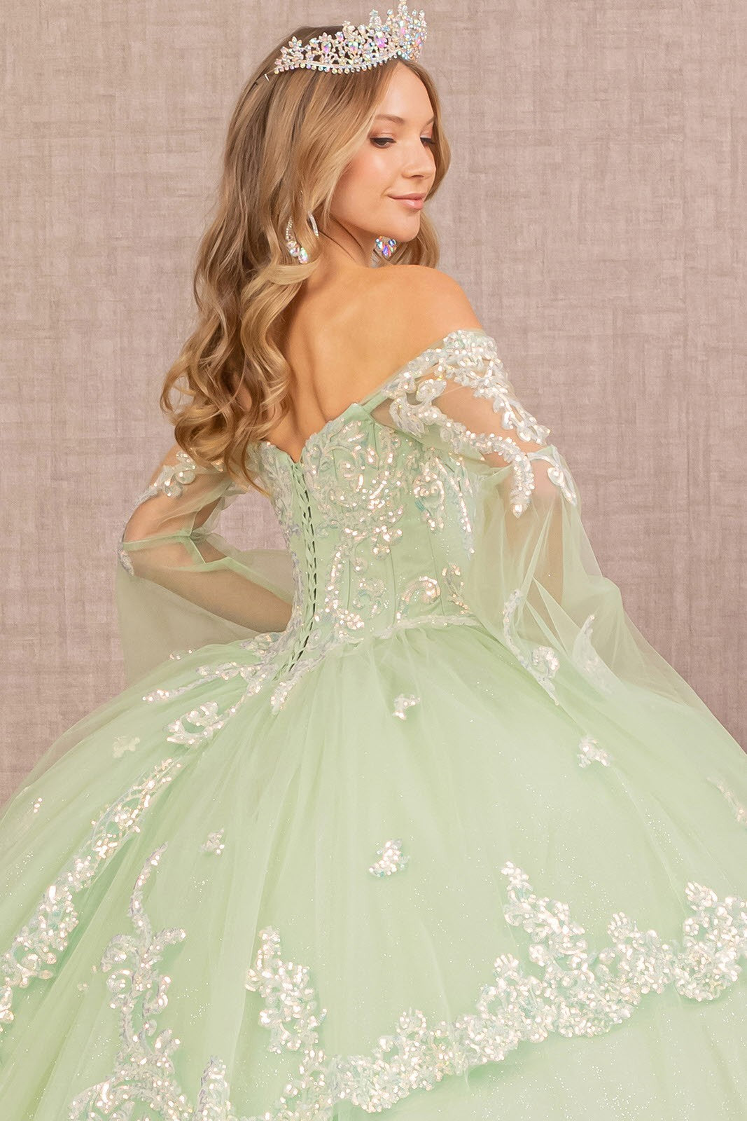 Long Sleeve Glitter Layered Hem Quinceanera Gown